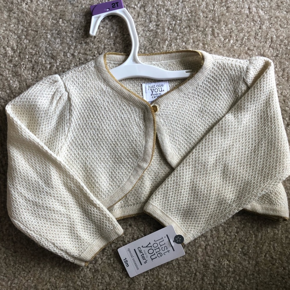 Never worn ivory and gold sweater with tags!